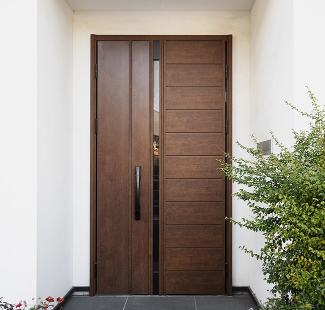 Installation et ajustement de portes en Alu, Bois et PVC à Croix